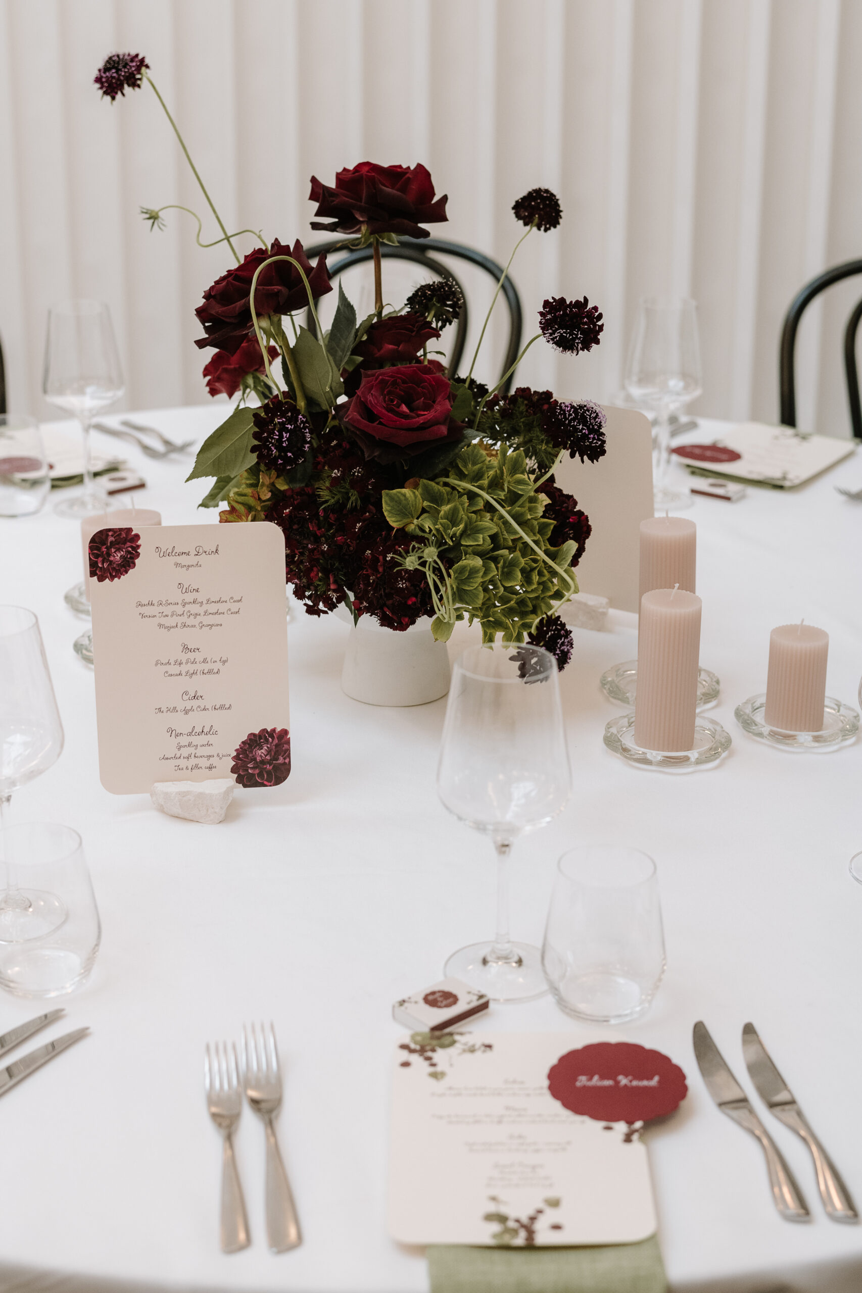 Detail shot of anthurium flower illustrations on luxury wedding menu card