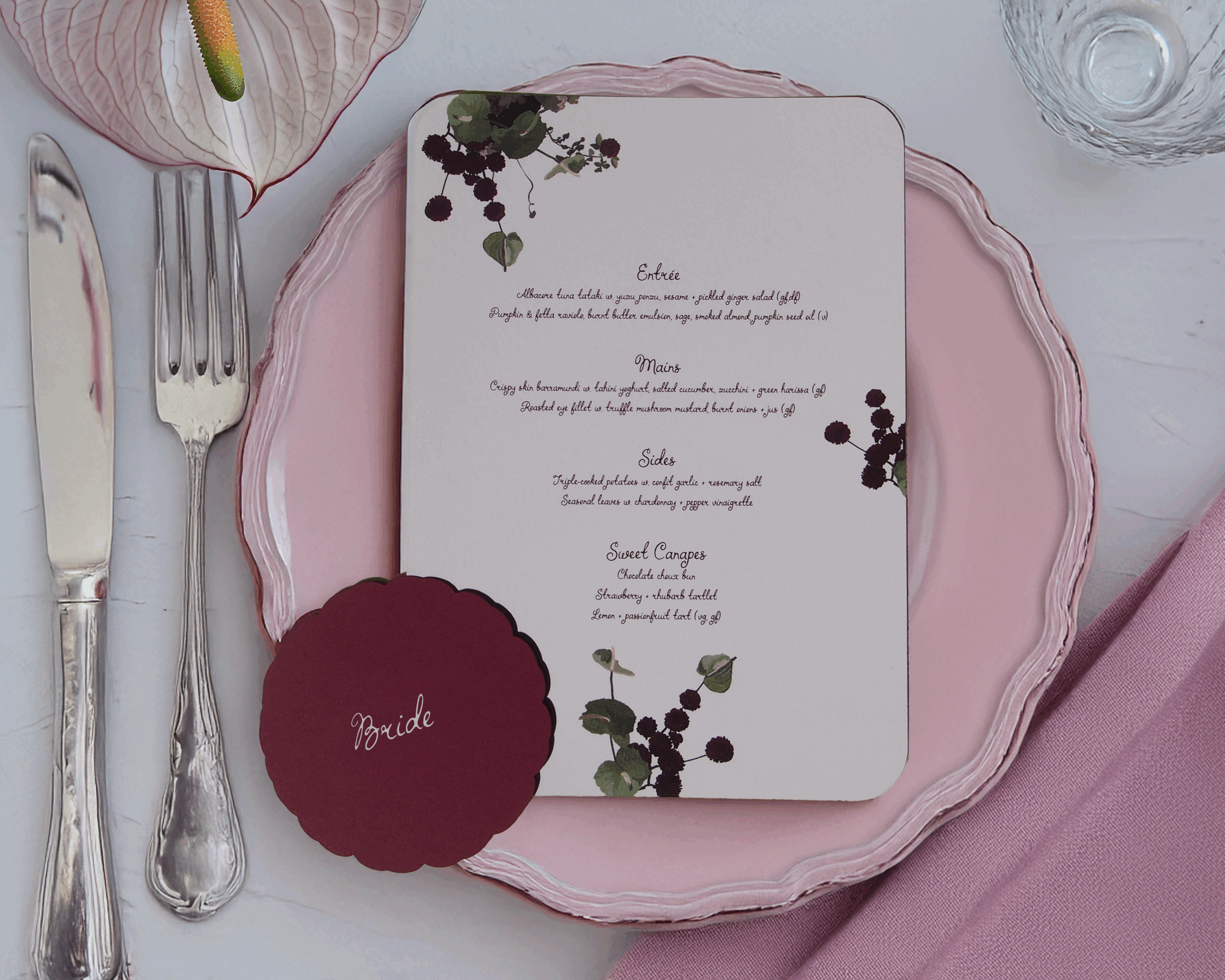 Elegant wedding table setting with custom floral menu for Sophia and Julian